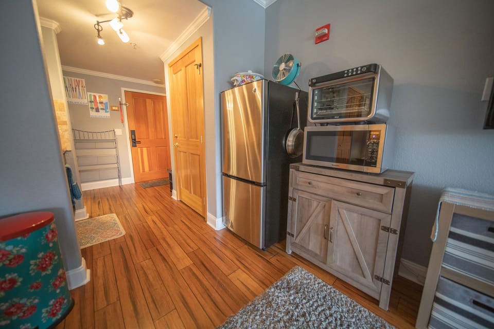 Large fridge, toaster oven and microwave
