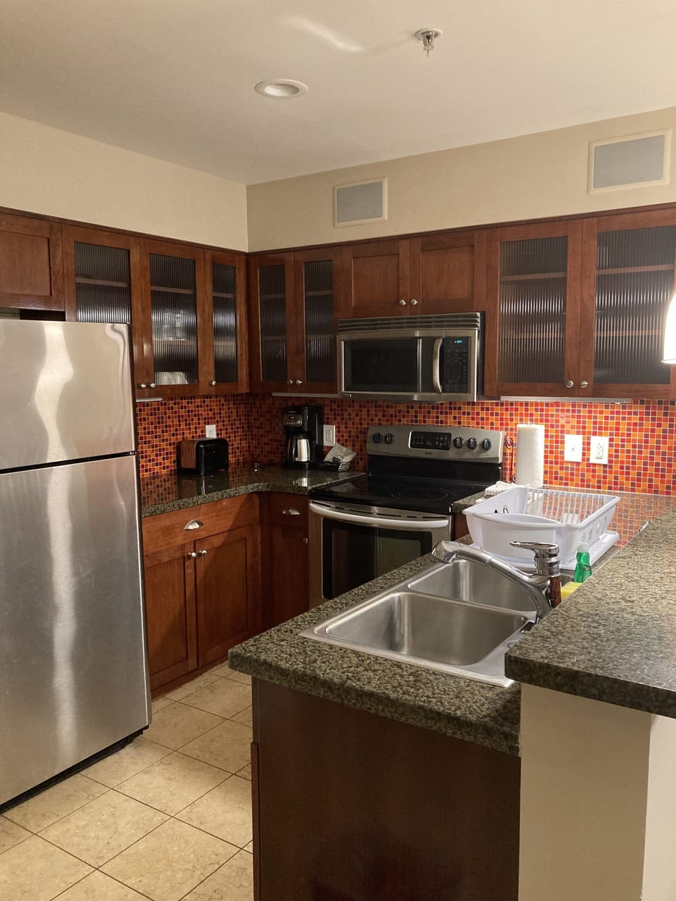 full kitchen, frig, oven, microwave, dishwasher, double sink, utensils, etc