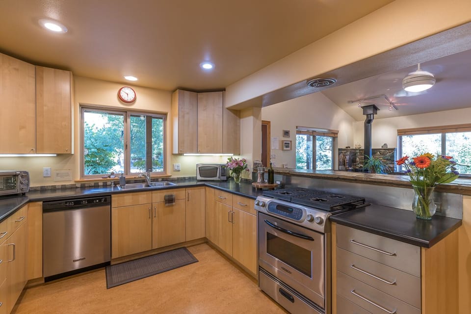 The kitchen is designed for easeful cooking with friends and family. 