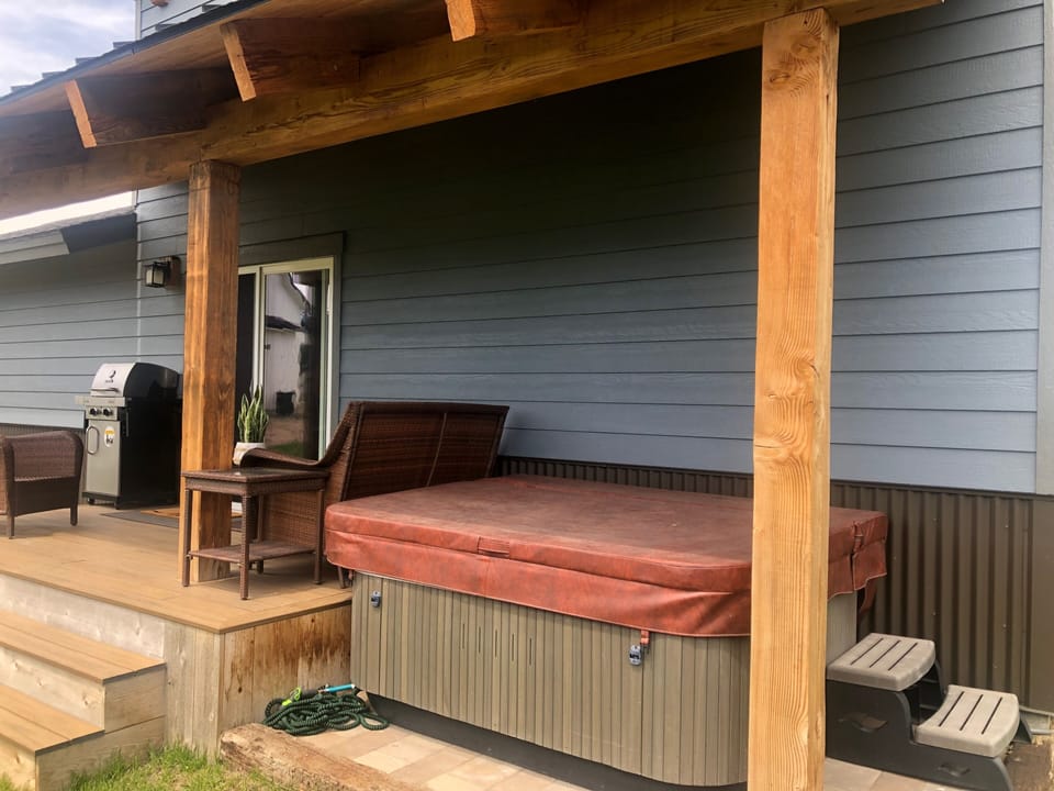 Relax in Hot Tub just off Back Deck - Ideal for Three People.