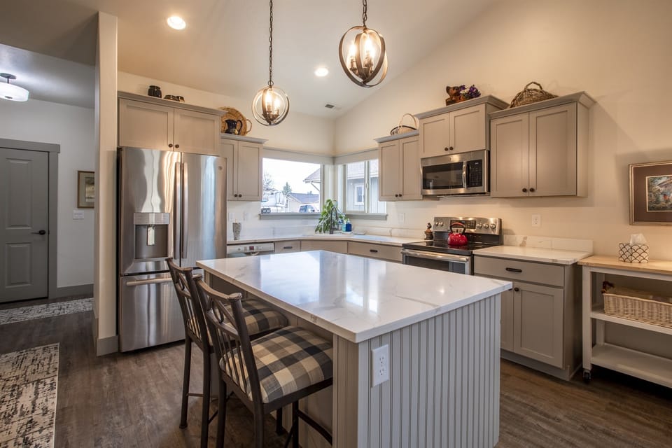 Kitchen with large island, great for preparing your own meals