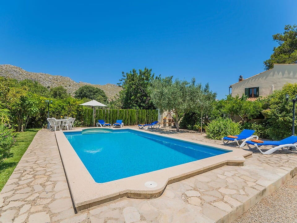 Water, Sky, Property, Building, Plant, Swimming Pool, Azure, Rectangle, Shade, Chair