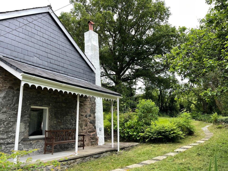 Veranda of Graden cottage with view of private garden