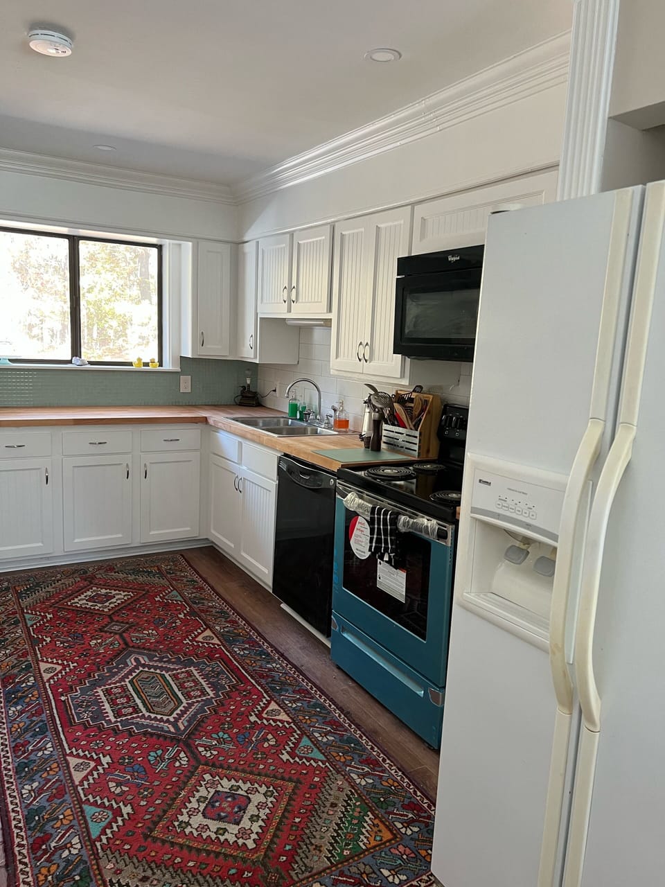 Electric range dishwasher and ice maker