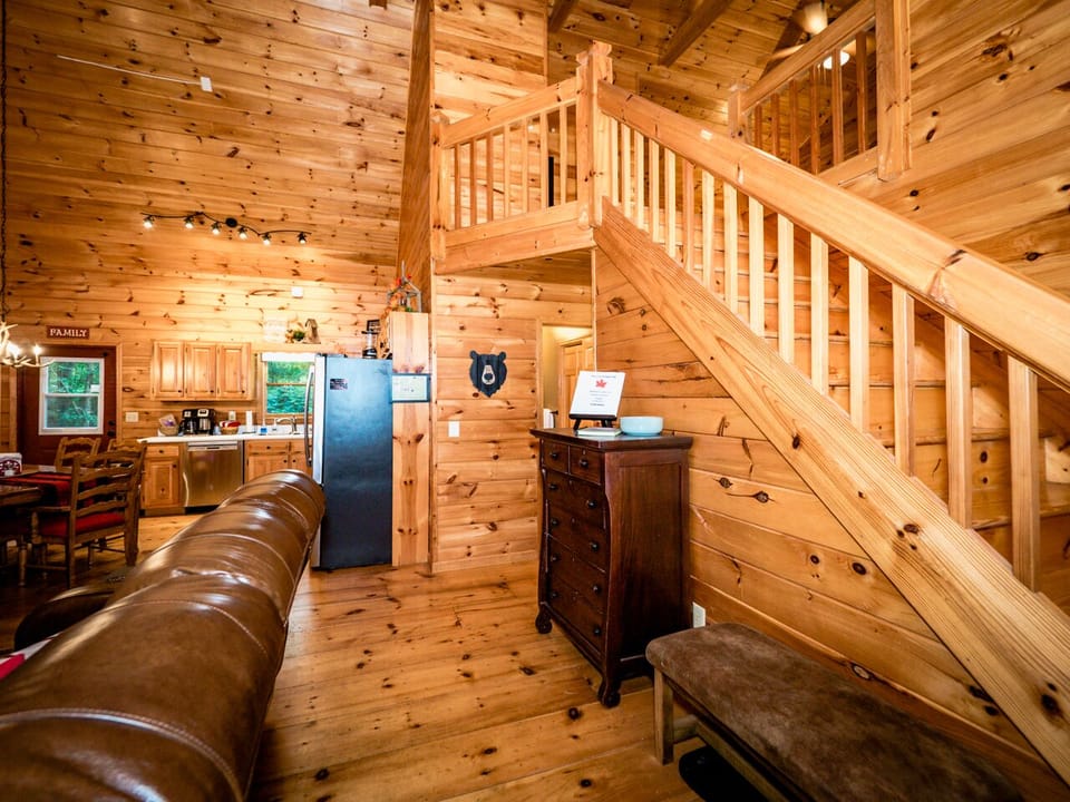 Stairs to the loft bedroom and private deck.