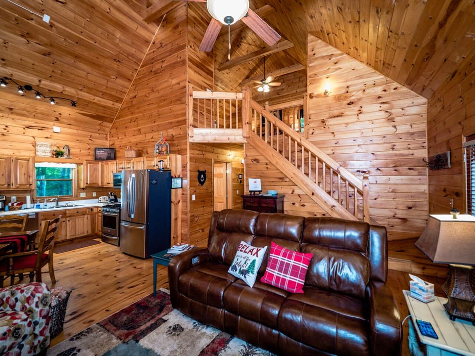 Soaring wood ceilings and wood walls give that cabin vibe.
