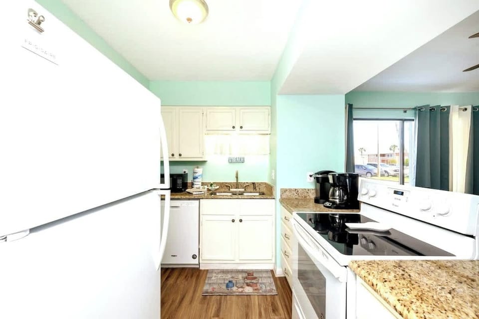 We've stocked this kitchen with appliances, dishes, bake ware, pots & pans, silverware, utensils, crockpot, flat griddle, toaster, blender, and a traditional coffee maker & Keurig!