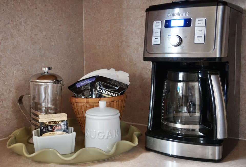 Coffee, tea, sugar, drip machine and french press available.