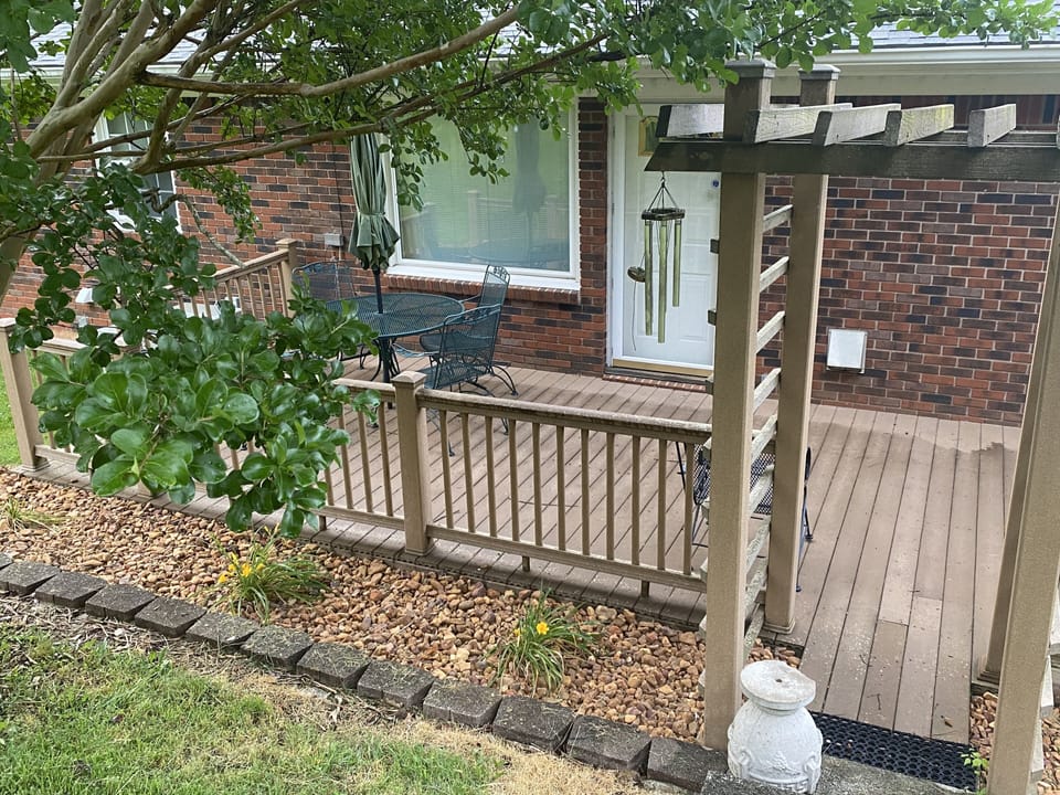 Peaceful back deck with gas grill