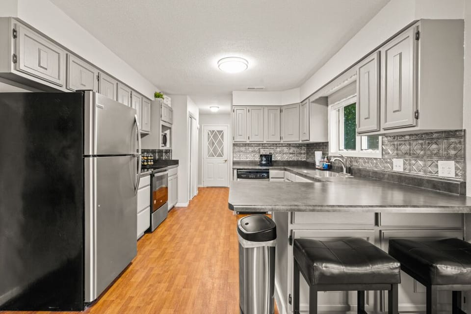 Roomy with stainless steel appliances.