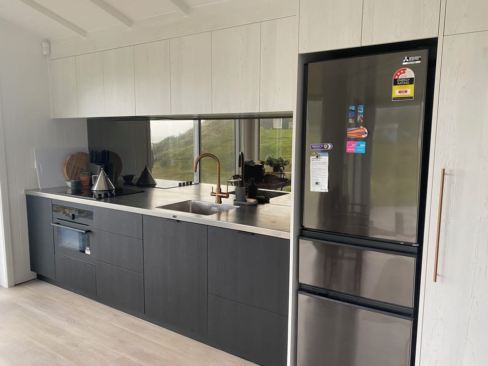 Recently installed kitchen, complete with dish drawer & filtered water tap.