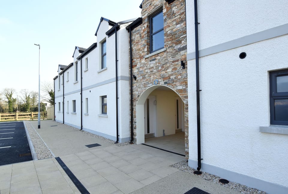 3 Bedroom apartment is to the left of the archway 