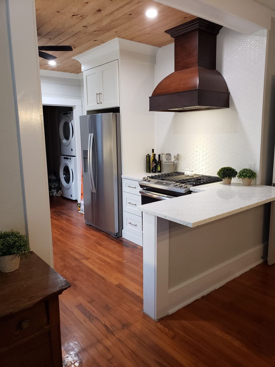 Kitchen with laundry down the hall.  Full washer and dryer