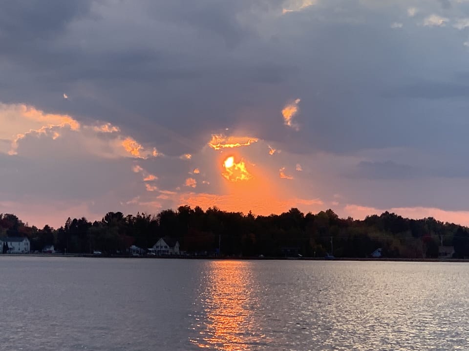 Sunset over a nearby lake