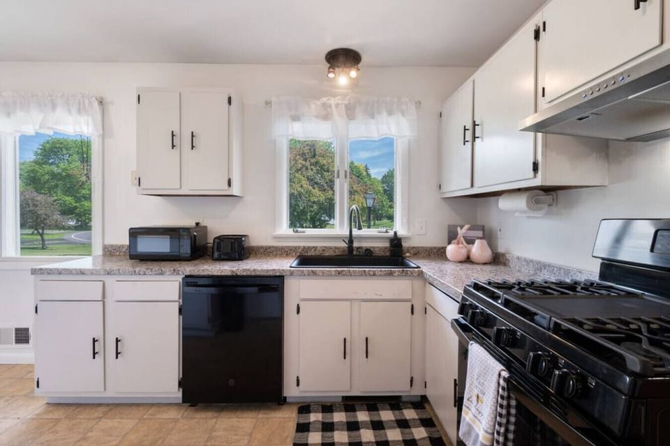 Fully equipped kitchen with cooking pots, etc. and gas range.
