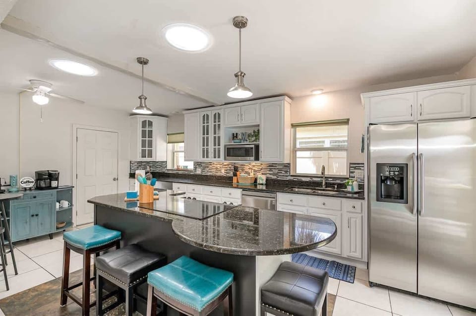 Updated Kitchen with Stainless Steel Appliances, Island and Coffee Bar
