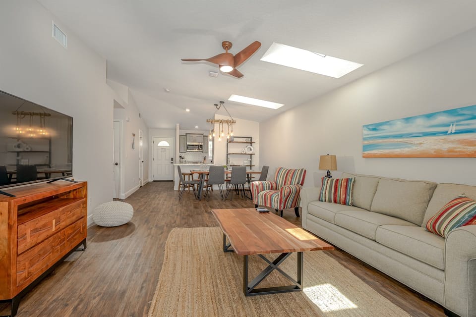 Island Time Living Room w/ 55" HD Smart TV and Dining Table