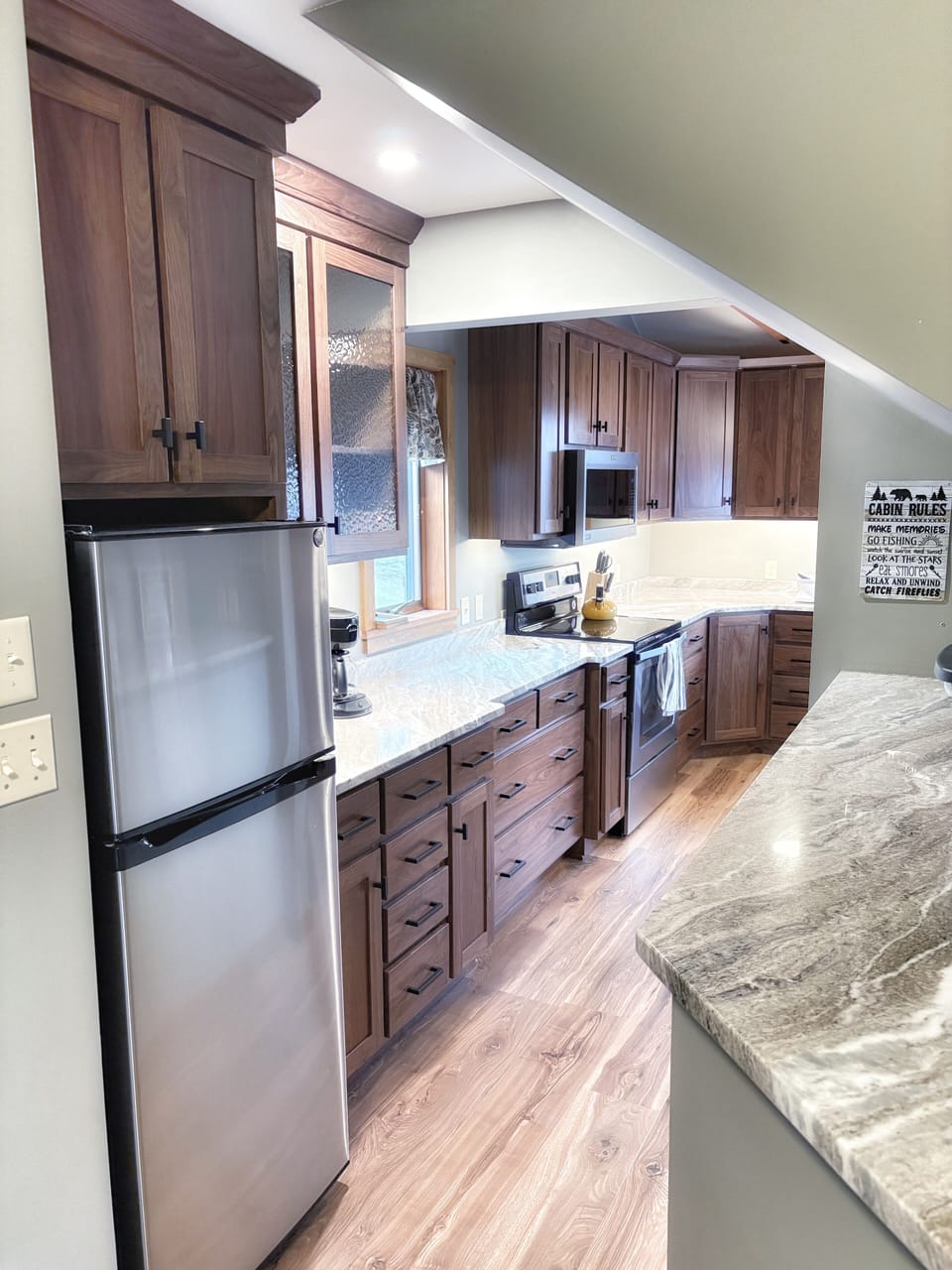 Kitchen to the left just inside front door 