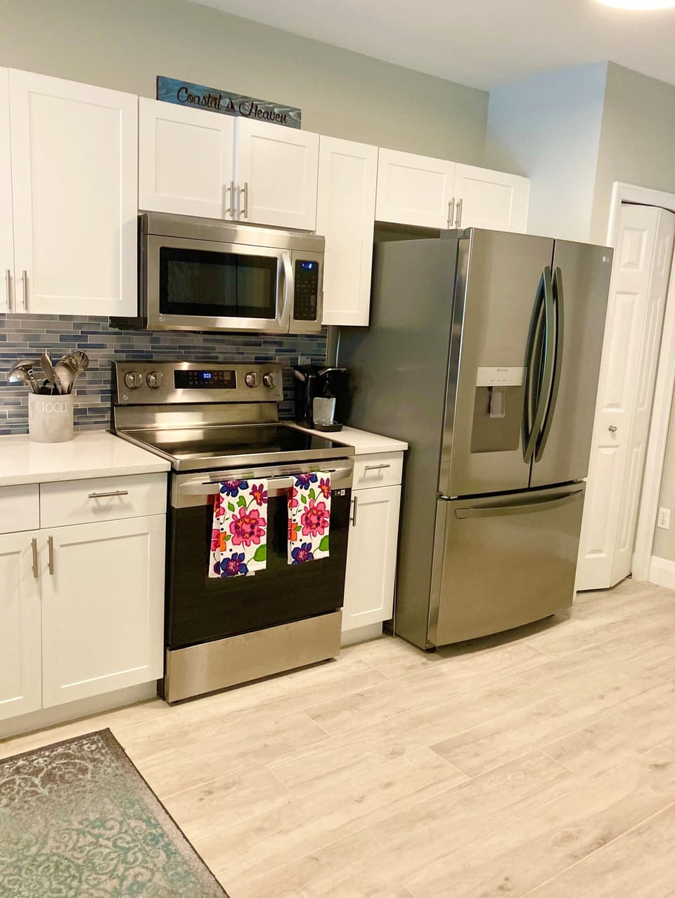 Remodeled Kitchen with quartz counters and new stainless appliances.