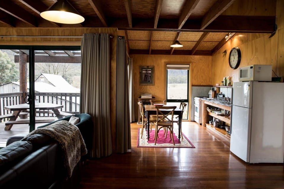 Kitchen / dining/ lounge and view of private deck
