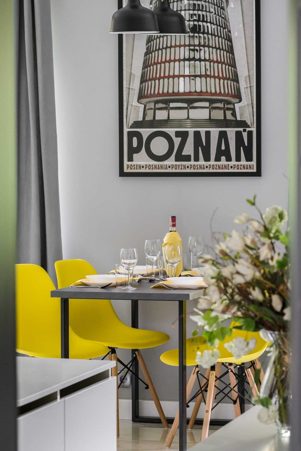 Large table with chairs for eating communal meals. 