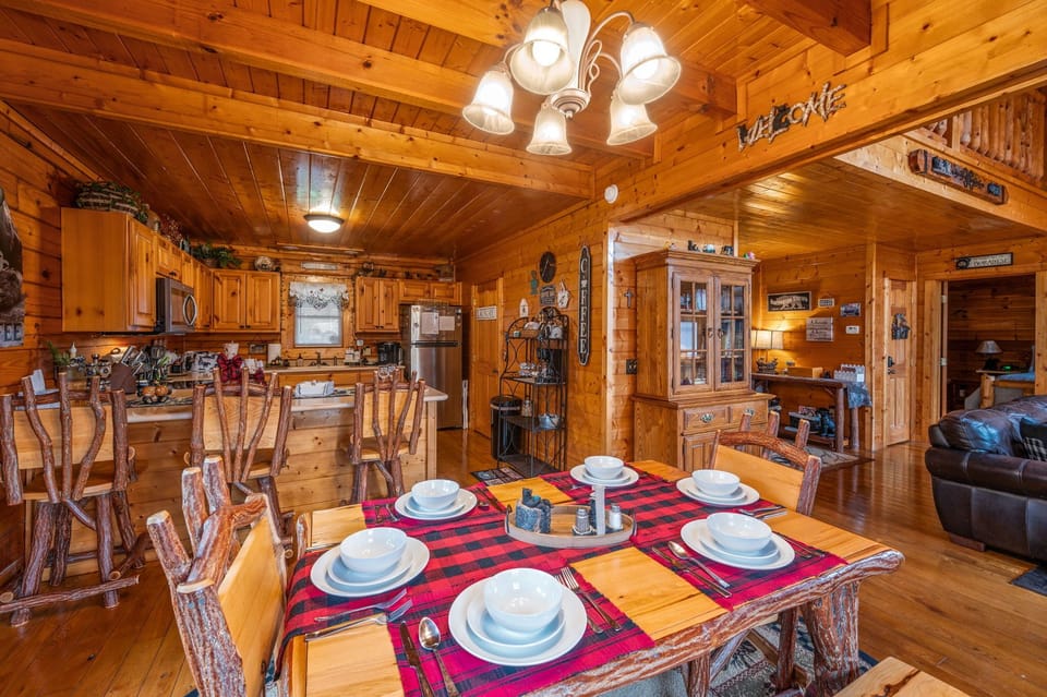 Dining Room: Gather around the rustic table for hearty meals and laughter amidst warm wood accents!