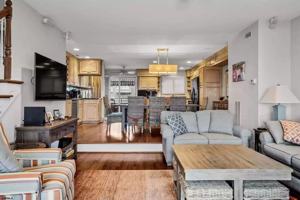 Picture of the living room, kitchen is in the back