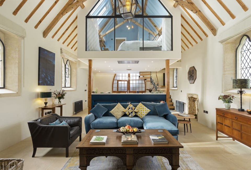 Architect-designed interior with vaulted ceiling and suspended bedroom 'pod'