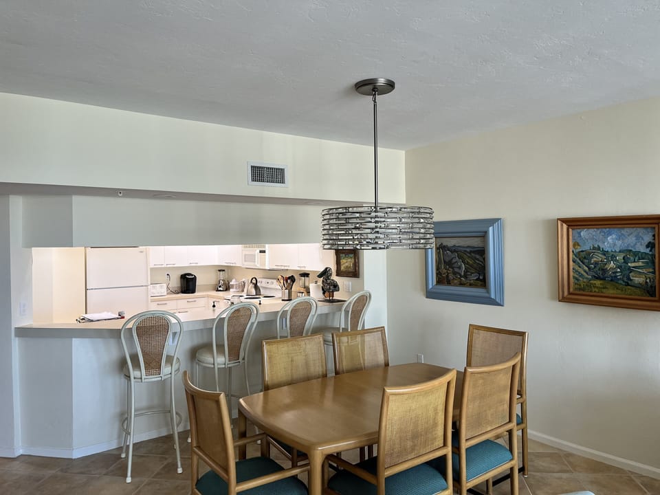 Plenty of space for dining.  Kitchen view is of the Gulf.