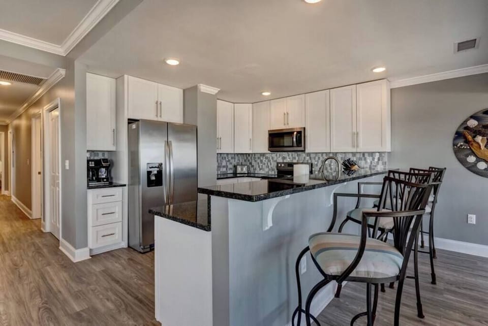 another picture of the beautiful kitchen with extra bar seating 