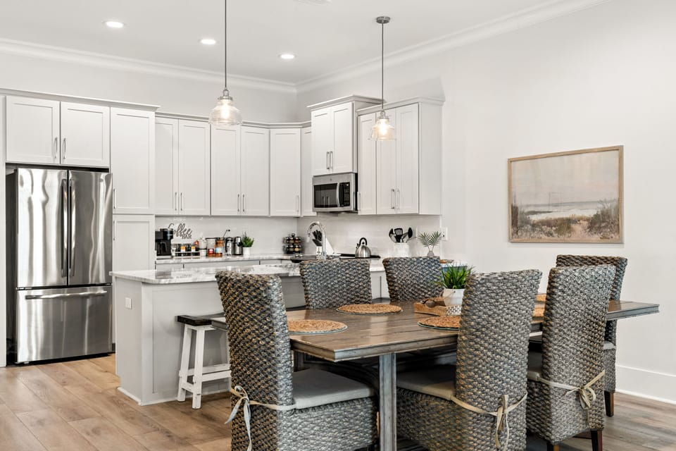 Dining table with 6 chairs plus 4 stools under counter