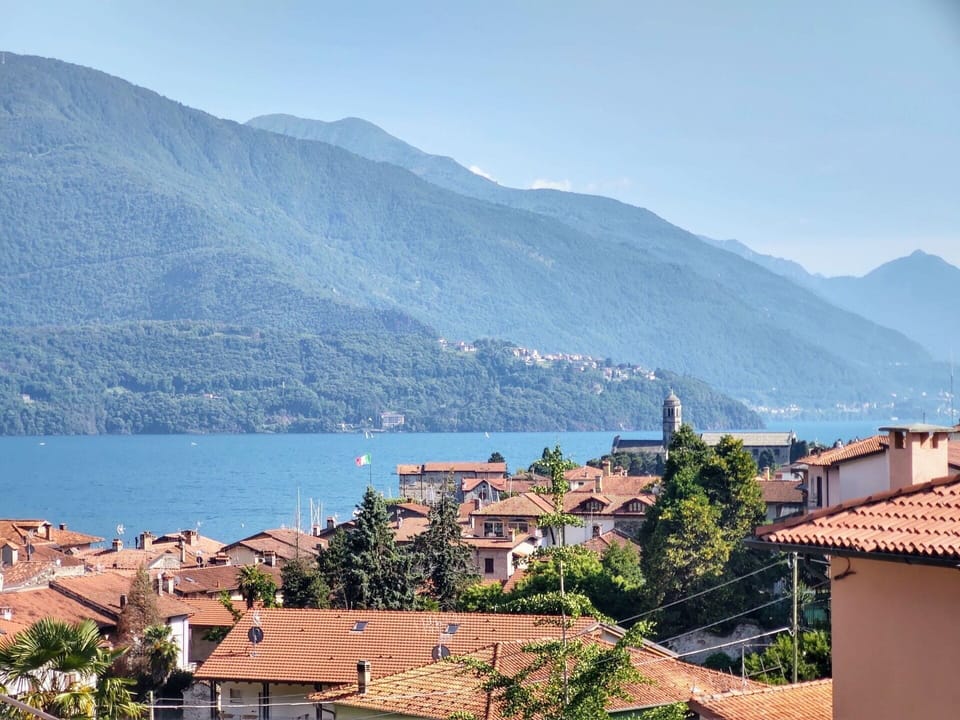 Sky, Water, Building, Daytime, Mountain, Cloud, Nature, Azure, Tree, Urban Design
