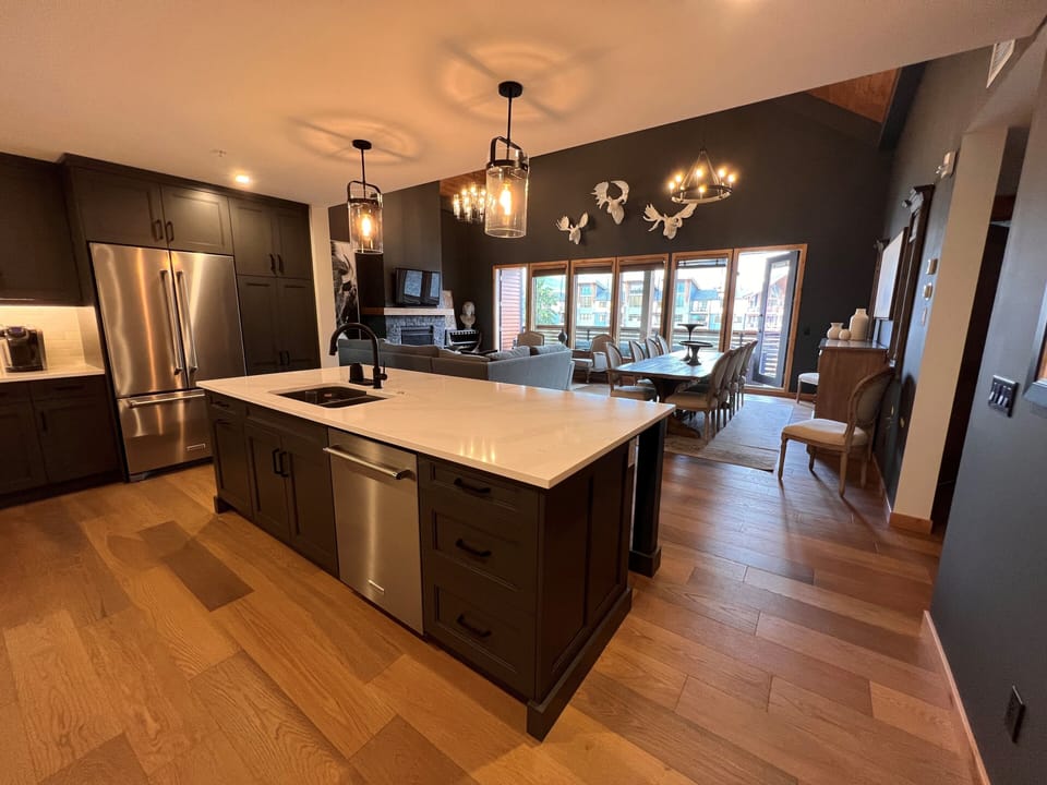 Spacious Kitchen Island overlooks dining room and living room