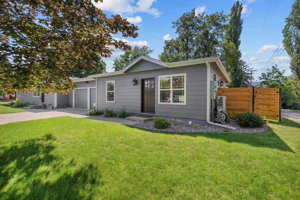 Beautiful home exterior with a parking area.