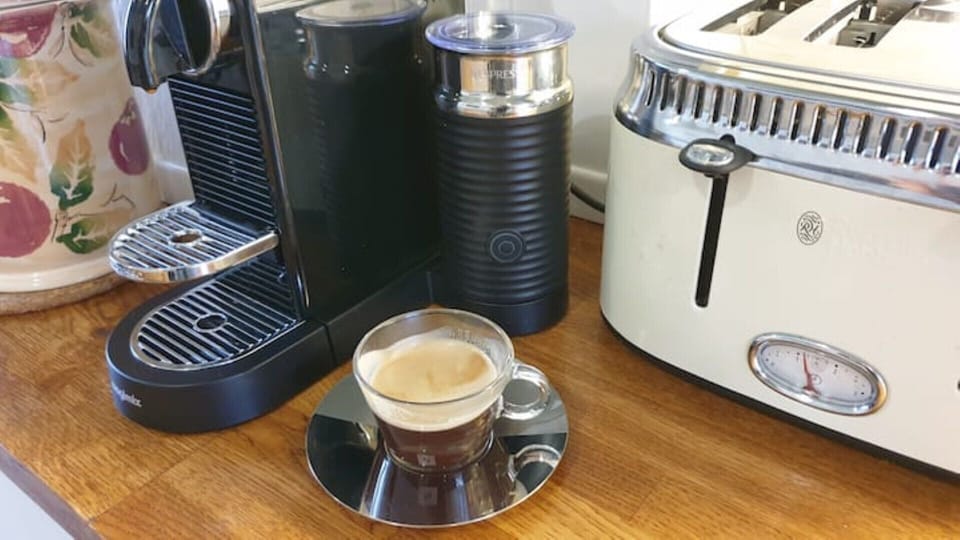 Coffee pod machine and milk frother provided...
