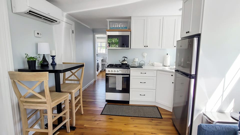Main living area has a kitchen and dining table