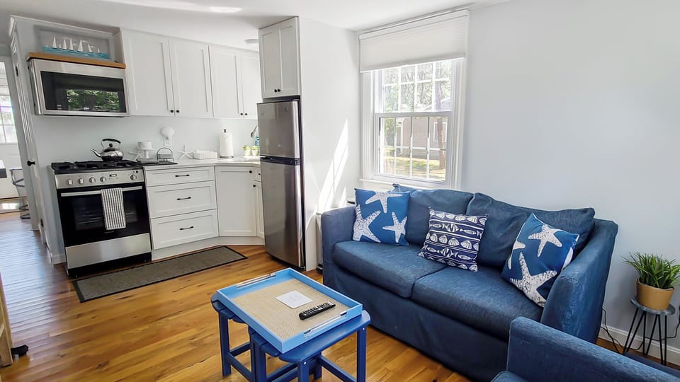 Living room with kitchen beyond