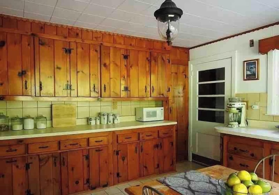 Large kitchen stocked with basic items for your cooking needs