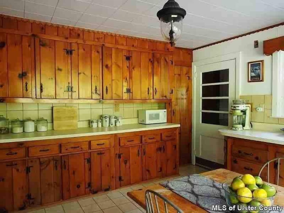 Large kitchen stocked with basic items for your cooking needs