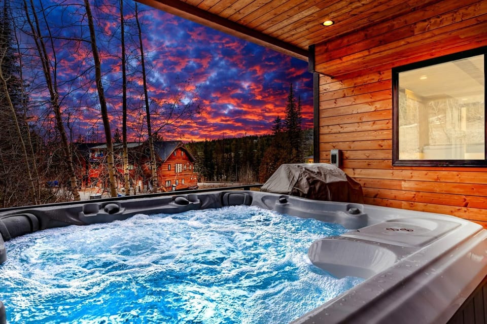 Enjoy a soak in the state of the art private hot tub after a long day of outdoor adventures!