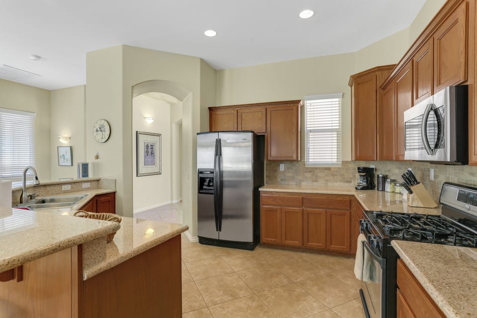 Fully equipped kitchen with ample counter space and storage