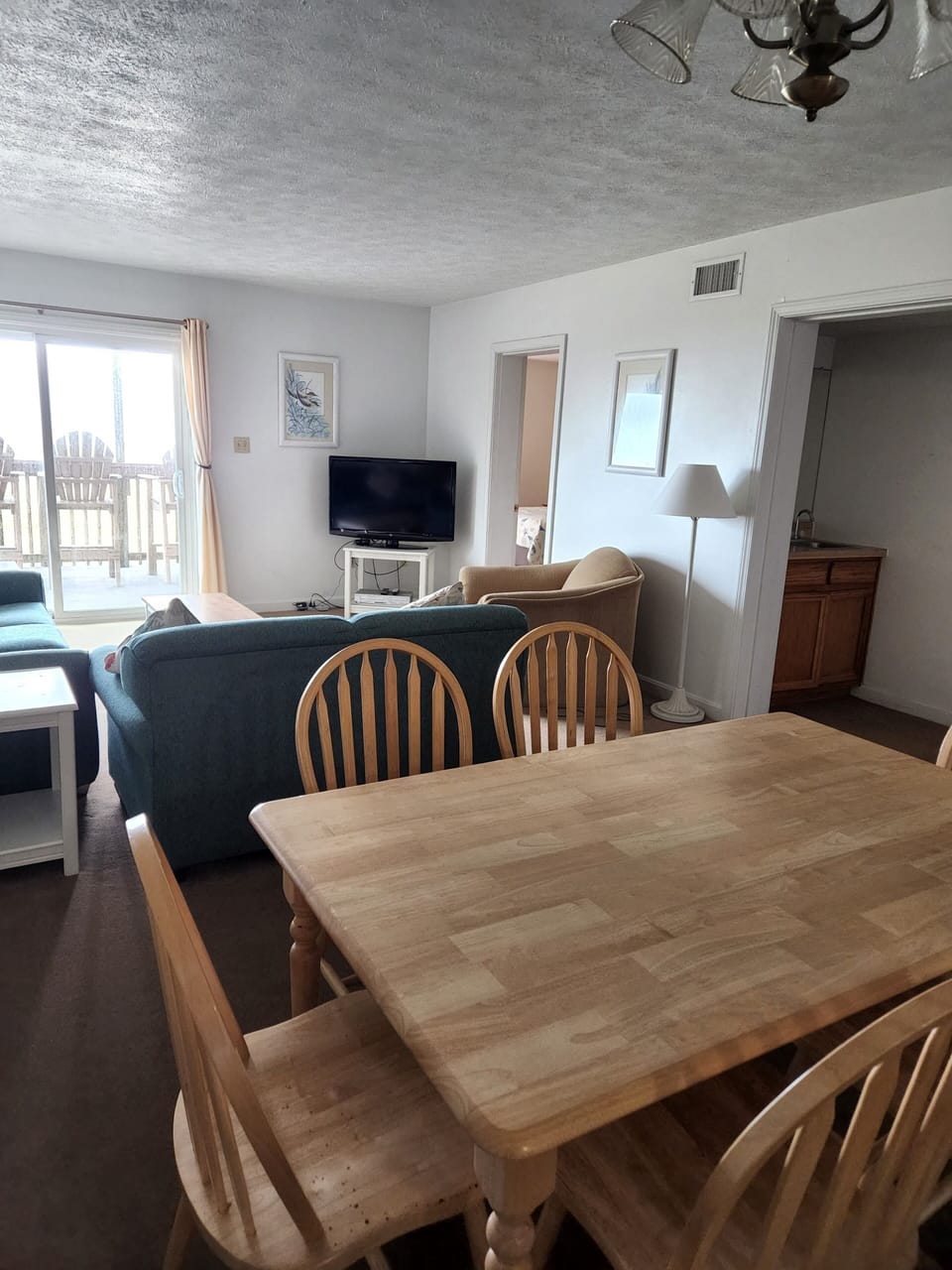 Dining Area with living room in background