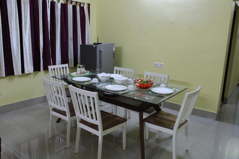 A dining fable with six chairs.