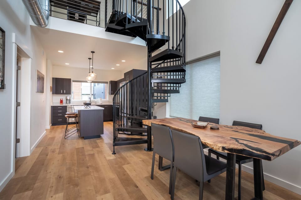 The live-edge dining table is perfect for any meal | Main Level