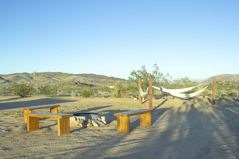 Three cozy hammocks next to the firepit - perfect for stargazing