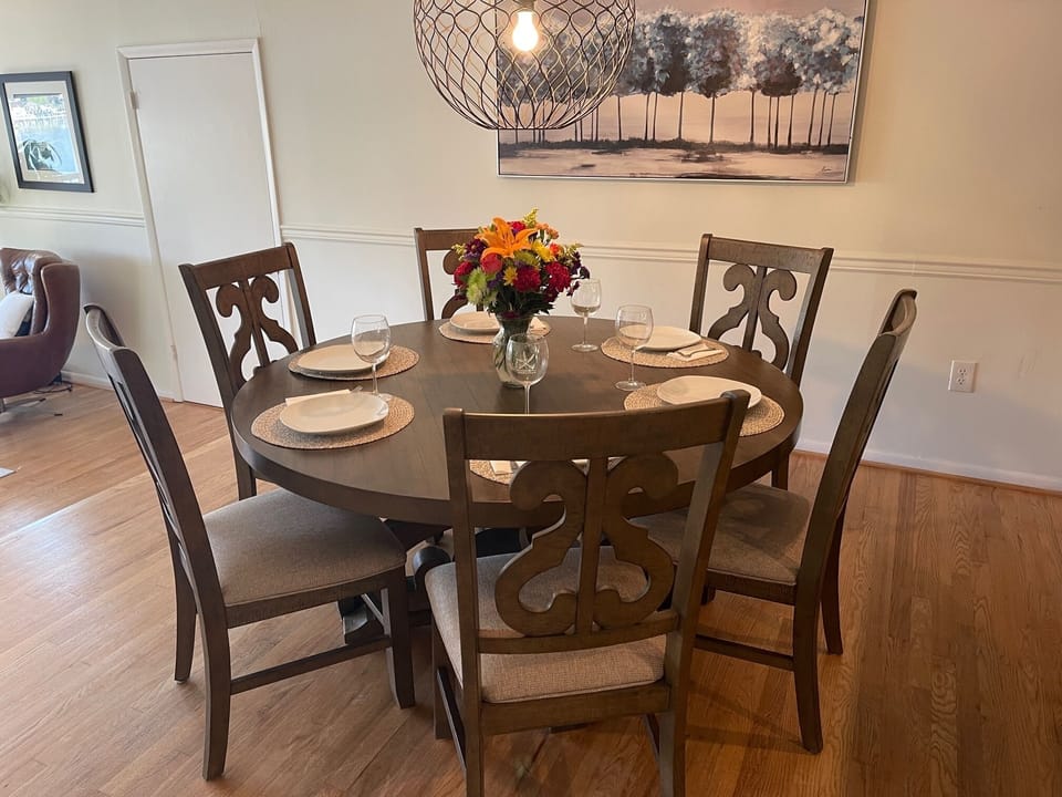 Dining table with water views, seats six comfortably