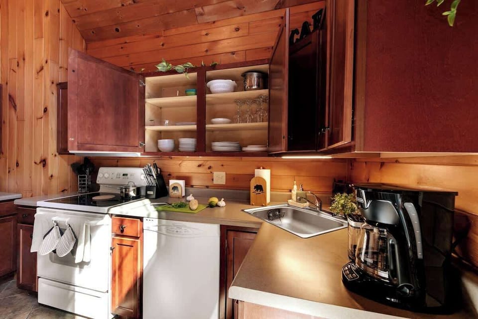 Plenty of dishware, glassware, drink ware to bring outside, serveware, and more are provided.
