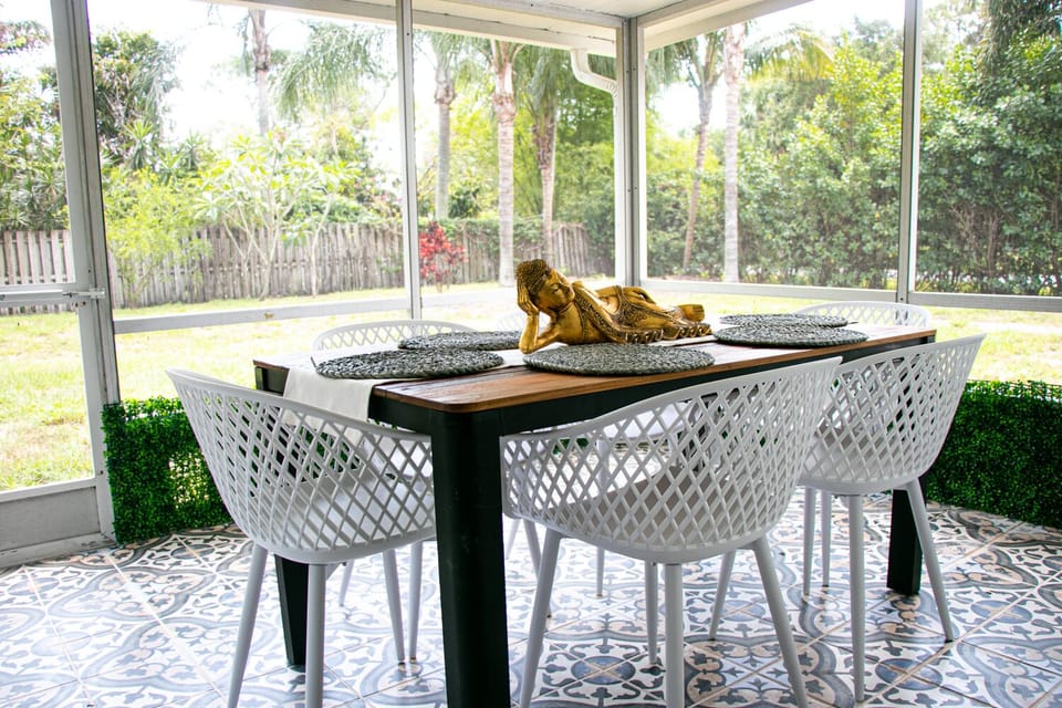 Enjoy outdoor dining in our fully screened Lanai.
