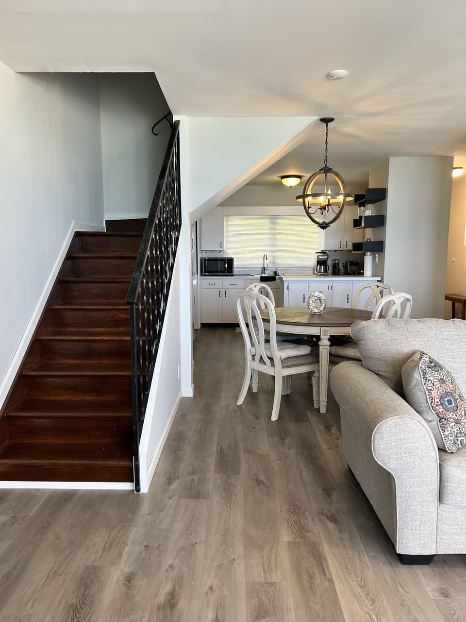 Stairs lead to the two bedrooms