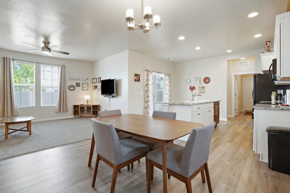 Open concept living room, dining room, and kitchen